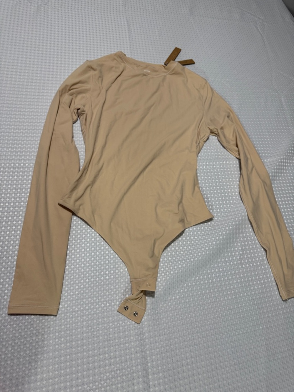 Skims long sleeve bodysuit. Medium